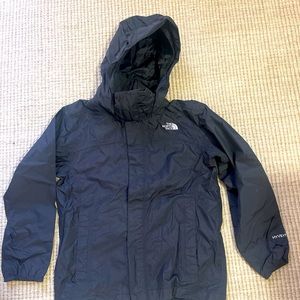 Boys Northface Anatora Rain Jacket in great condition. Black size small 7/8